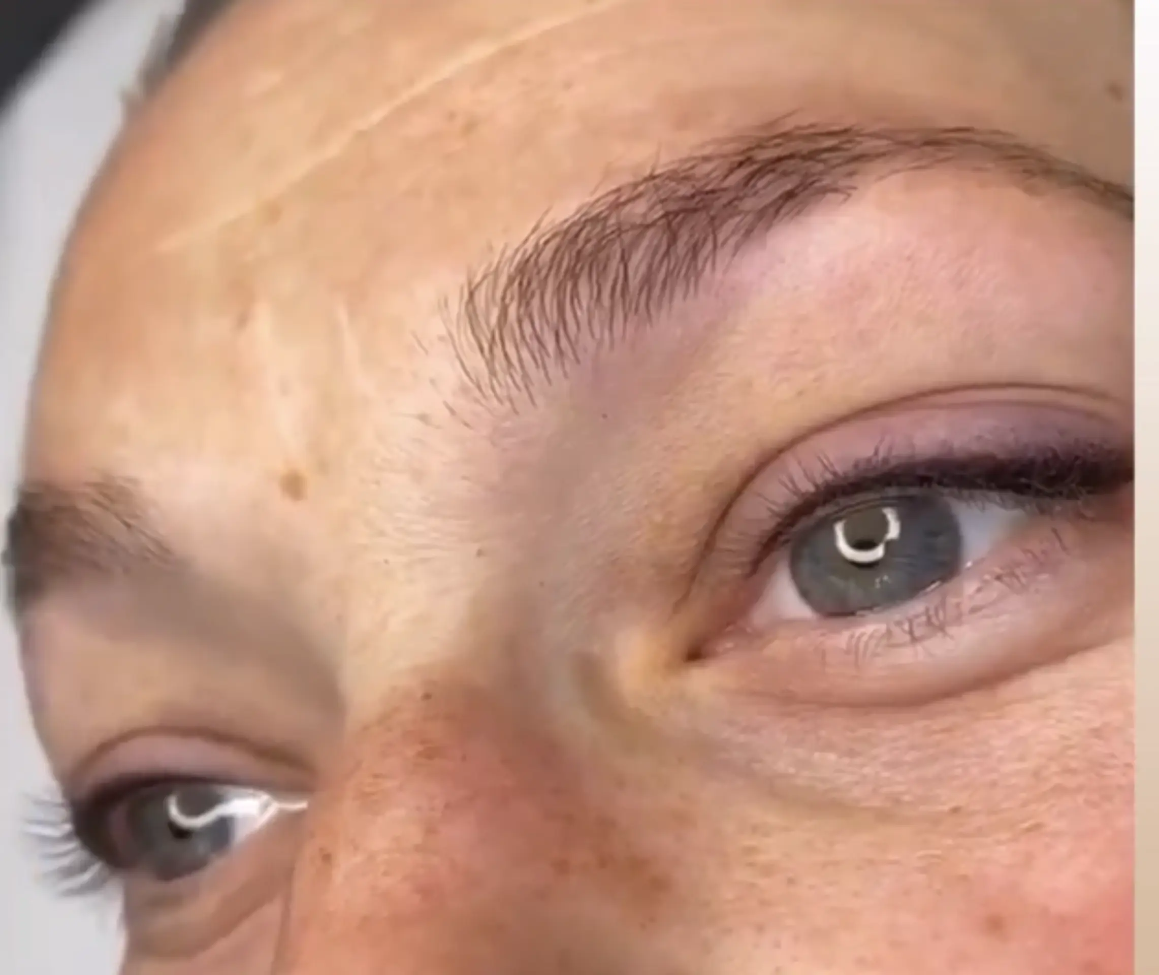 winged eyeliner tattoo